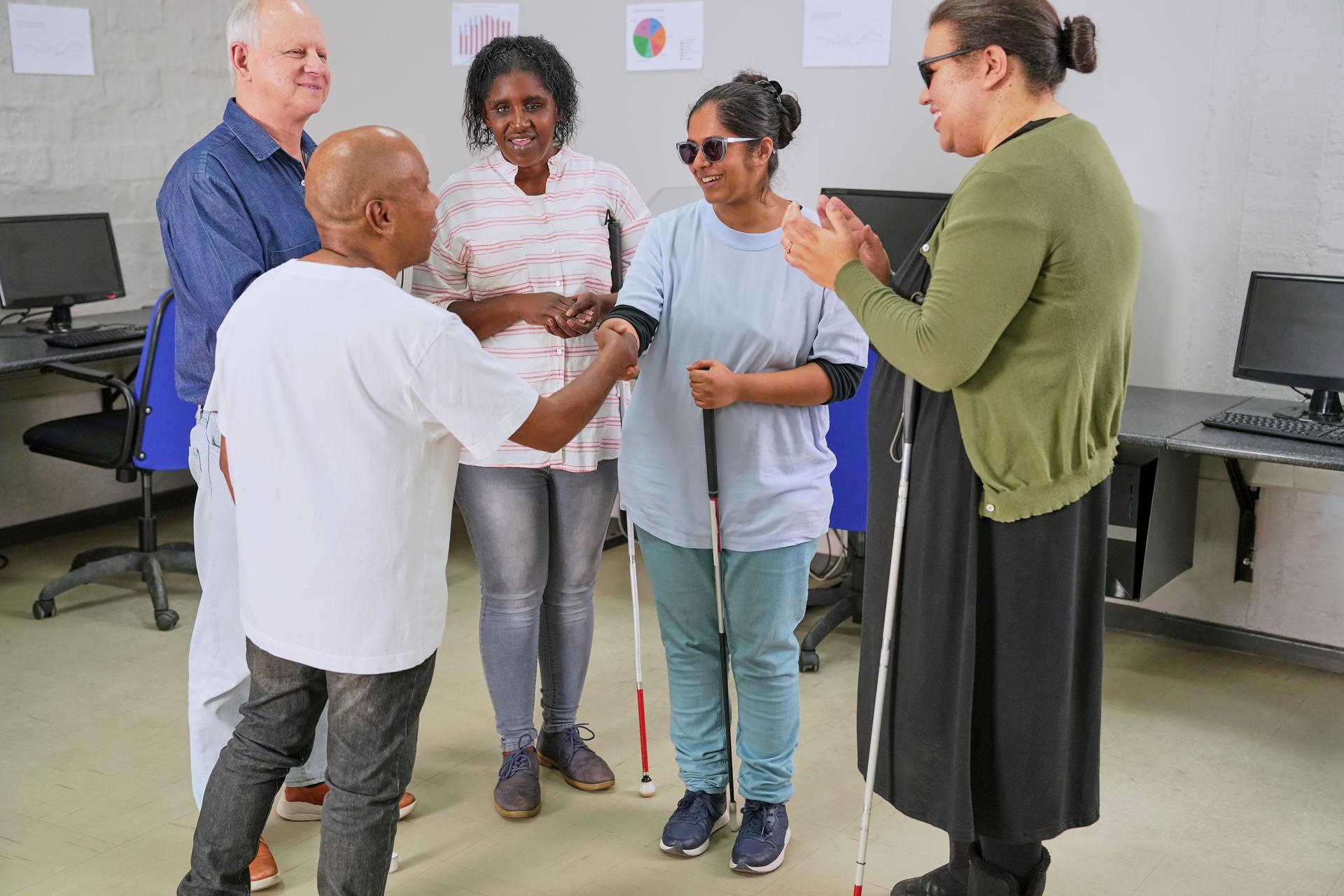 Visually impaired people in office